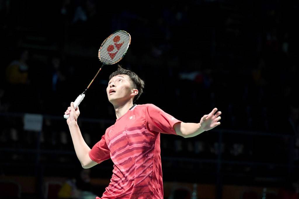 Man playing badminton